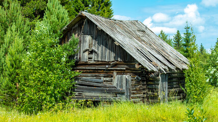 abandoned wooden hut of a forester in the taiga,backgrounds