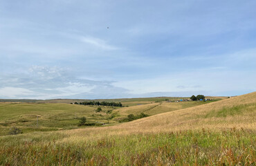 Obraz premium Landscape, with extensive moors, and hills, on a cloudy day near, Waterworks Road, Delph, UK