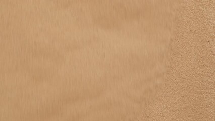 sand pouring down the dune, sand pouring in close-up
