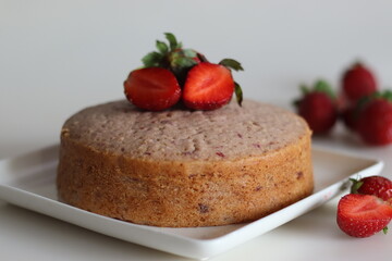 Strawberry cake. A simple tea time cake, flavored with fresh strawberry puree