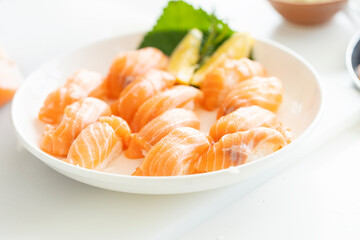 Japanese food. Salmon sushi with rice. Various sushi on plate.