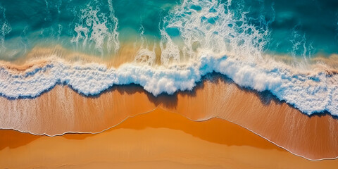 Fototapeta na wymiar Gorgeous sandy beach with golden yellow sand and beautiful turquoise sea waves, top view