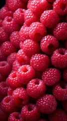 Delicious fresh and juicy raspberries from the garden.. Perfect for wallpaper, background, posters, prints or video. This is a generative picture.