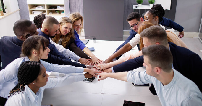Diverse Business Team Stacking Hand