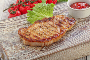 Grilled pork steak with ketchup