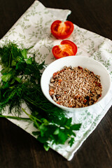 bulgur grits with spices, herbs and fresh vegetables for cooking. vegan food