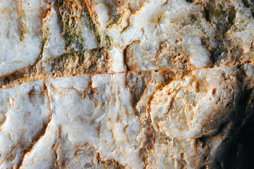 Close up unique rich beautiful raw wild marble stone texture.  Background for design. Copy space.