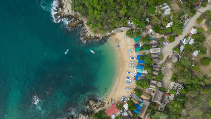 Bird's eye view over perfect bathing conditions at Puerto Angelito beach, Puerto Escondido, Oaxaca,...