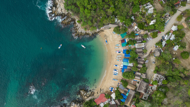 Bird's eye view over perfect bathing conditions at Puerto Angelito beach, Puerto Escondido, Oaxaca, Mexico 