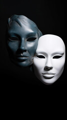 Composition of two masks, in white and black colors.