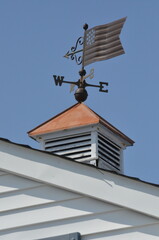 American flag weathervane on roof