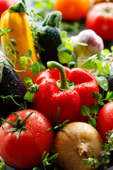 Fresh summer vegetables and aromatic herbs, close-up view