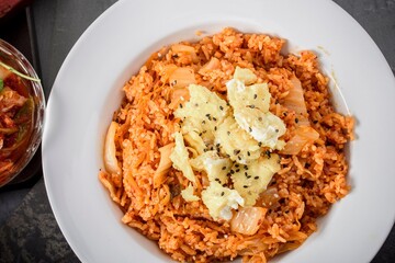 Savory Fusion: Close-Up of Kimchi Fried Rice, a Delectable Blend of Flavors, Captured in 4K Resolution