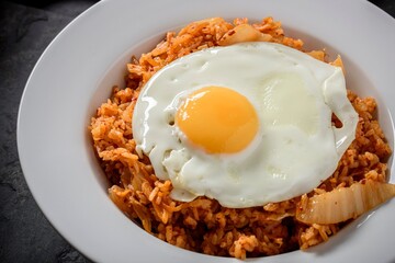 Savory Fusion: Close-Up of Kimchi Fried Rice, a Delectable Blend of Flavors, Captured in 4K Resolution