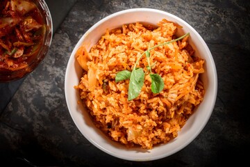 Savory Fusion: Close-Up of Kimchi Fried Rice, a Delectable Blend of Flavors, Captured in 4K Resolution