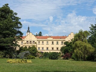 Fototapeta premium Castolovice chateau historical baroque castle Castolovice building and surrounding park with rose gardens, Bohemia,Czechia-Zamek Castolovice,chateau gardens