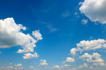 white clouds in the blue sky - 626393947