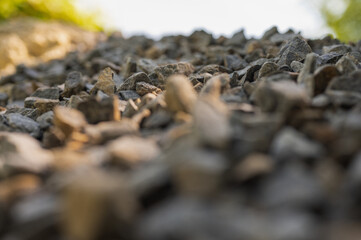 Rubble as background, natural stone, selective focus, graphic resource