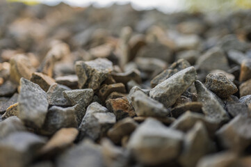 Rubble as background, natural stone, selective focus, graphic resource