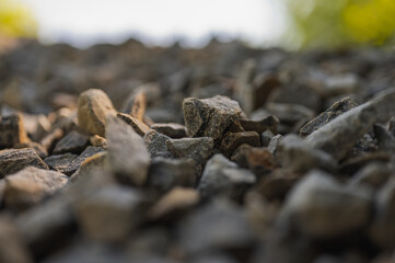 Rubble as background, natural stone, selective focus, graphic resource