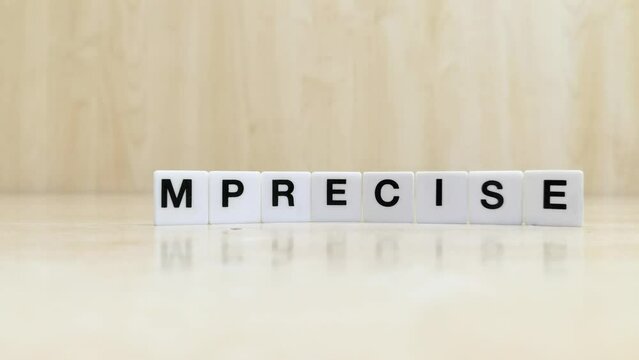  Tiles that make up the word imprecise are modified to make up the word precise