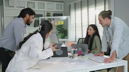 Product design team choosing colors to make product package inside office, concept brainstorming, coordination, teamwork
 - Powered by Adobe
