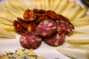 Plate with variety of Spanish gourmet snacks as starter or during wine tasting