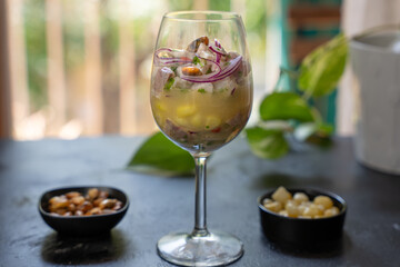 Typical Peruvian dish called Ceviche, served in a crystal glass.