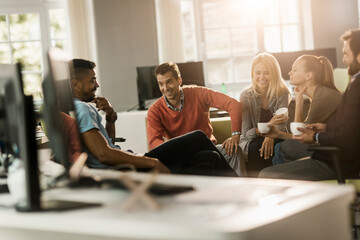 Young people having a meeting in a startup company office