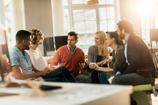 Young people having a meeting in a startup company office