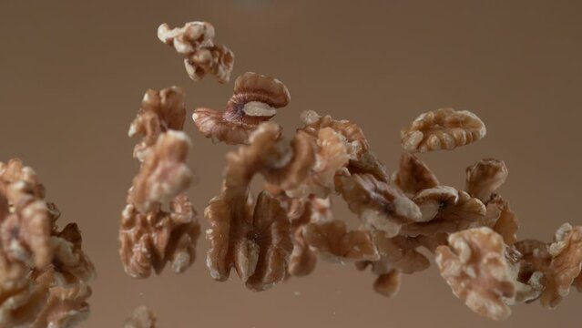 Walnuts falling in slow motion