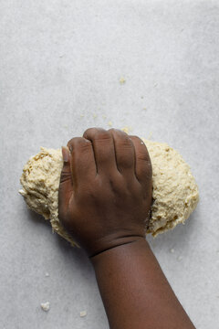 Hand Kneading Bread Dough On A Marble Surface, Female Hands Kneading Sticky Dough, High Hydration Dough Being Kneaded On Marble Table