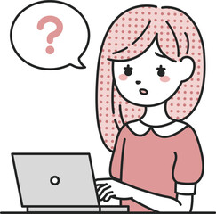 パソコンの前で考える女性