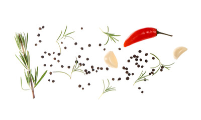 Flying fresh spices on white background