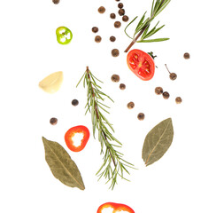 Flying aromatic spices and herbs on white background