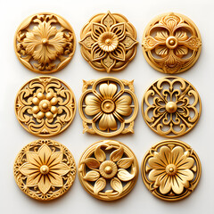 several golden flowers and scrolls on white background