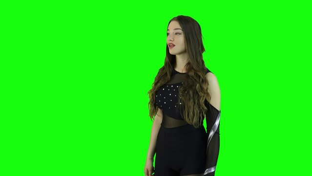Close up portrait scene of a female model acting in front of a green screen