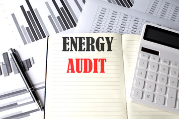 ENERGY AUDIT text written on a notebook on chart and diagram