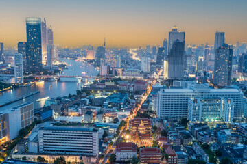 Naklejka na ściany i meble Condominium buildings, houses, expressway roads in the middle of the city. High angle view of the capital city of Bangkok, 