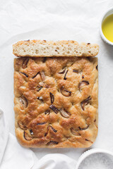 Top view of homemade onion focaccia on a white background, Flatlay of focaccia with red onion topping, fresh homemade focaccia bread