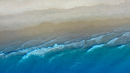 Obraz na płótnie Canvas Beach Wave water in the Tropical summer beach with white sand beach background
