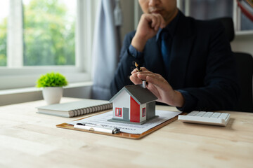 Property insurance, real estate broker or home insurance agent gesture protect house, house key,...