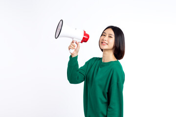 Asian woman smiling face holding megaphone shouting posing isolated on white background, photo studio background, with copy space