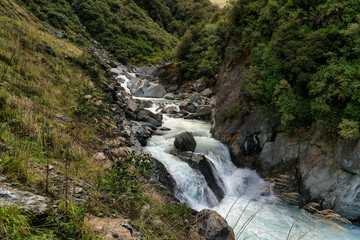The powerful Haast river flowing the Haast Gates through the mountain Pass