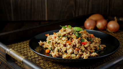 Thai food, stir-fried basil with pork and fried egg Thai popular food Spicy food, traditional Thai food concept.