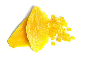 Dehydrated mango slices and cubes isolated on white. Candied diced mango fruits closeup