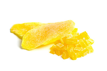 Dehydrated mango slices and cubes isolated on white. Candied diced mango fruits closeup