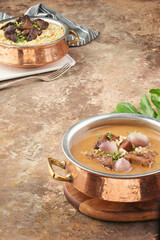 onion soup main dish on a rustic wooden background