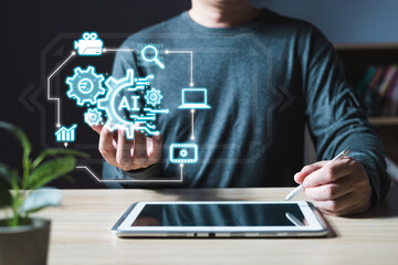 Man holding icon ai and use tablet, Marketers education, research, analyze media video streaming content creation and online marketing strategies to grow their digital business.