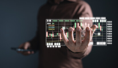 online marketing. man draw graphs and progress of business and analyze financial,and investment.Use technology to plan strategy to success goals and growth stock.online business,e-commerce.